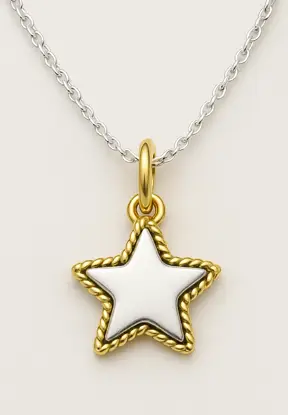 Dije dorado en forma de estrella con detalle blanco