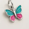Dije de plata con mariposa esmaltada en turquesa y rosa
