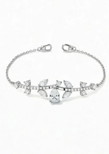 Pulsera plateada con flores y zirconias blancas