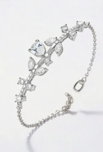 Pulsera plateada con flores y zirconias blancas